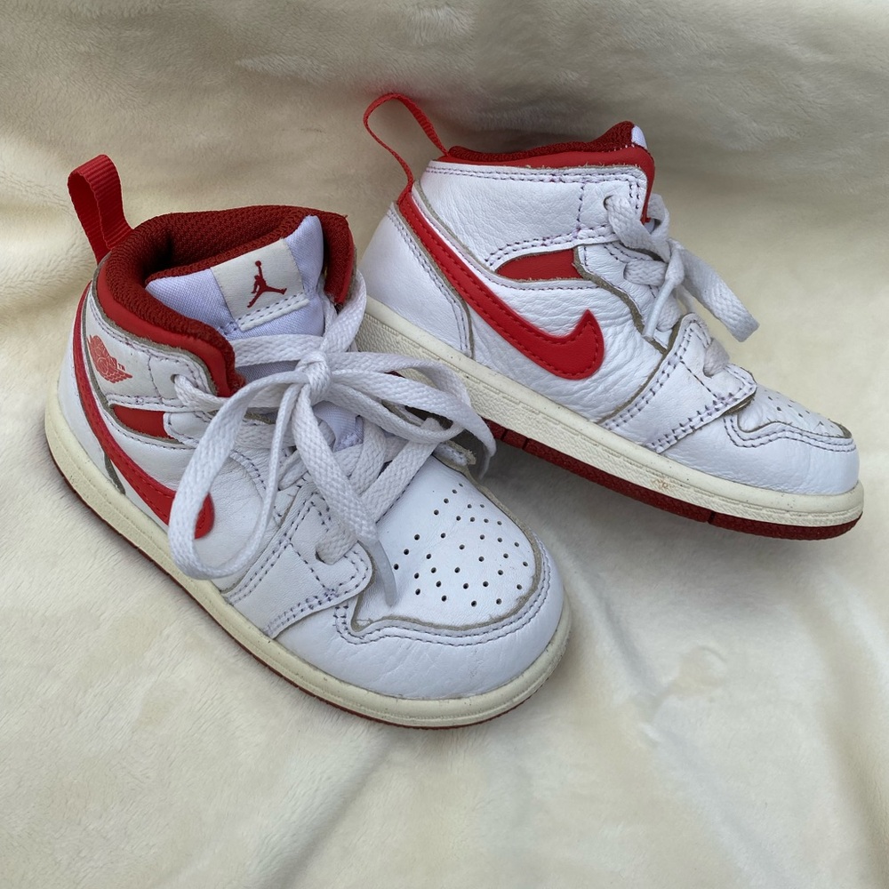 Nike Air Jordan’s 
Red and White.
Toddler size 8 
Great condition